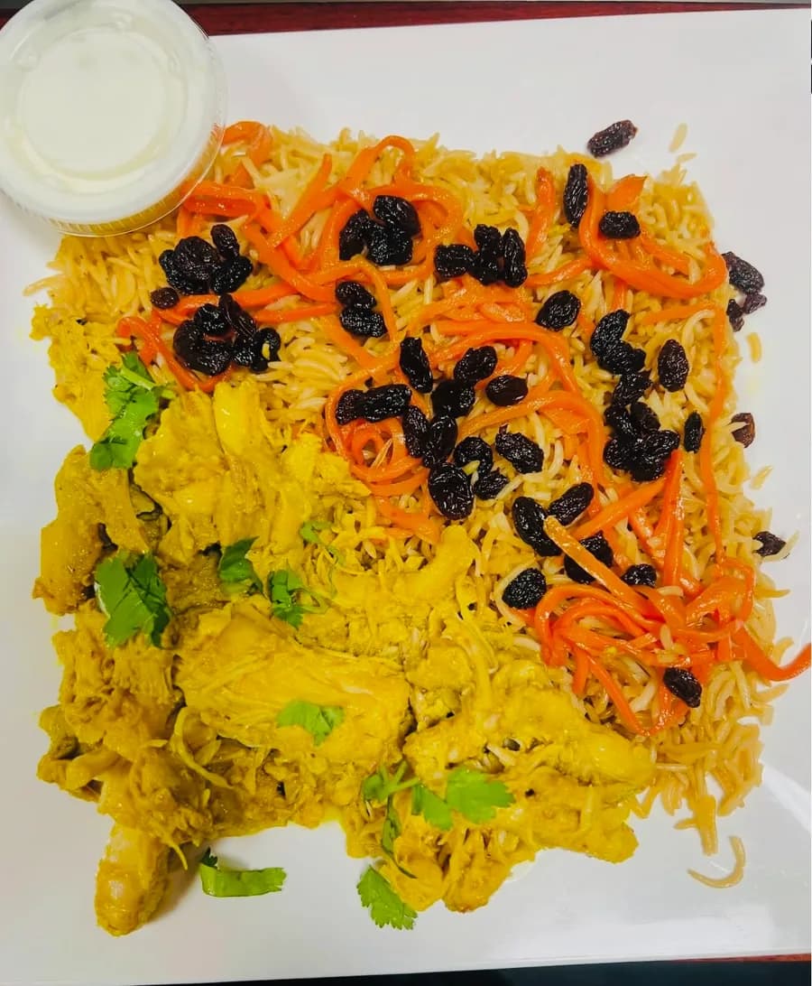 Chicken shawarma served over Qabli rice