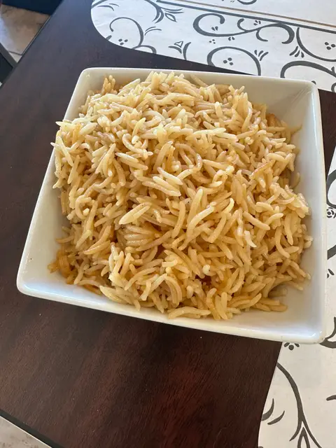 A tray of seasoned brown basmati rice